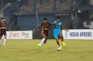 Indian Arrows' Rahim Ali goes past Jishnu Balakrishnan of Gokulam FC